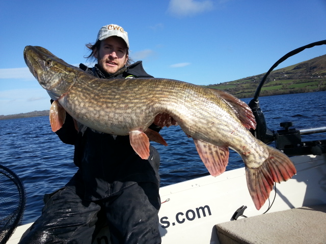 Teen angler reels in monster pike on Lake Harriet